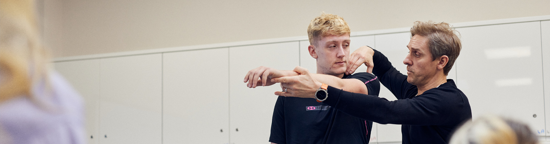 Teacher and student in a Sports Therapy demonstration.