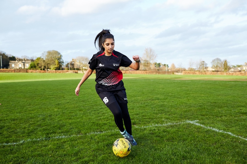 Ammarah Pandor action shot playing football.