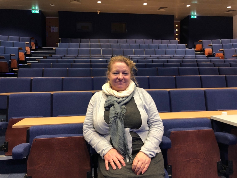 Gill Lambert in auditorium.