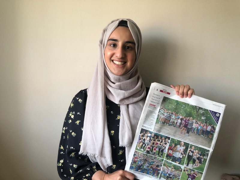 Haleema Saheed with paper.