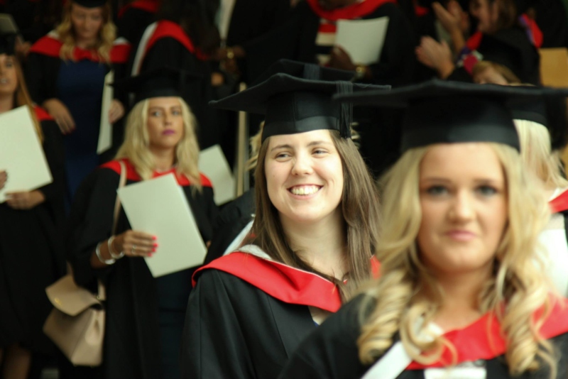 Rebecca Longbottom graduation picture leaving the Chapel.