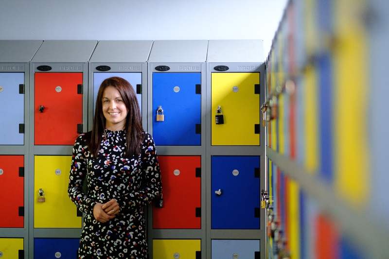 Sarah O'Mahony next to school lockers a.