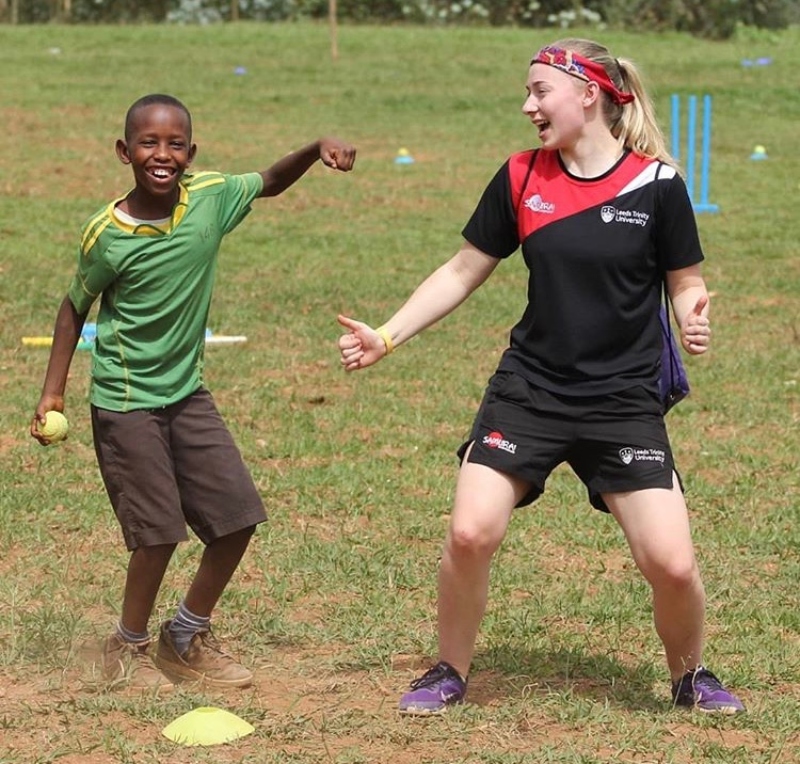 Sam Ashton coaching cricket.