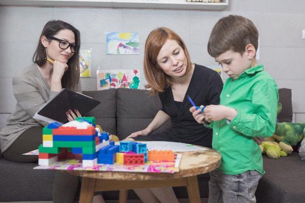 Psychologist with child subject.