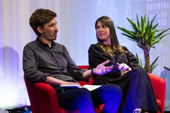 Panel members talking during a Trinity Conference session..