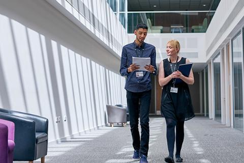 Male student with placement mentor.