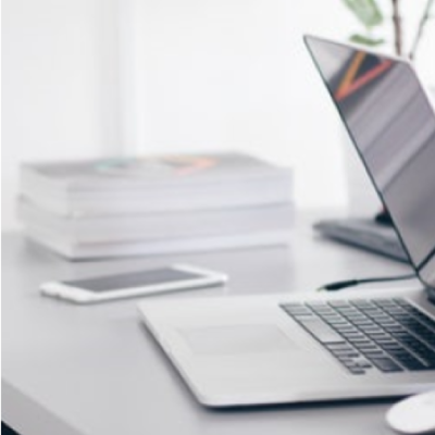 Laptop on desk.