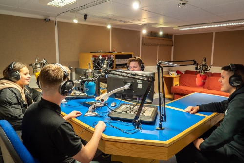 Students in radio studio .