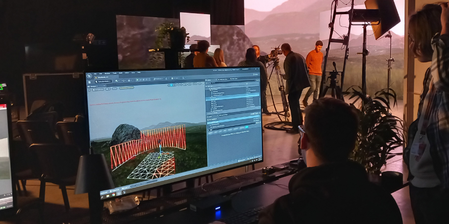 Students working in virtual production film studio.