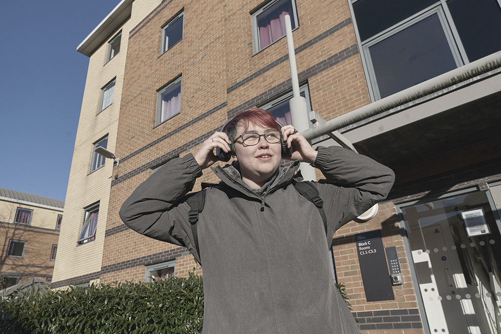 Student stood outside Clarence Dock Village.