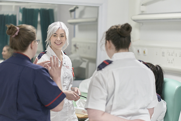 Three nurses during training.