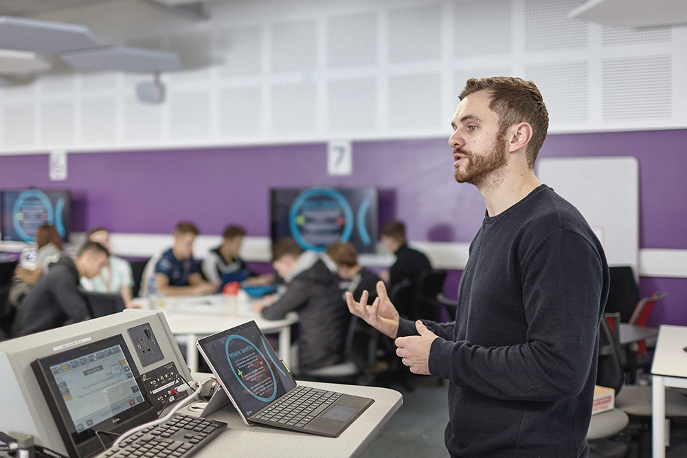 Lecturer teaching a class.