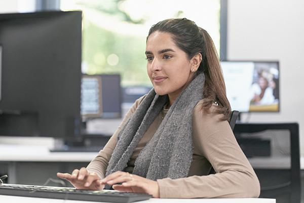 Student working on computer.