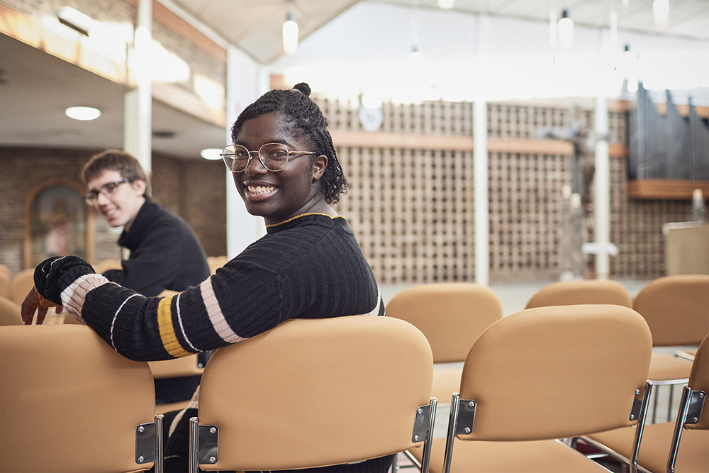 Student sat in LTU chapel.