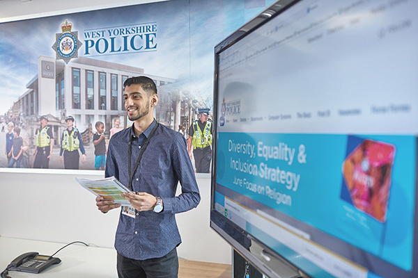 Student taking part in workplace training at West Yorkshire Police.